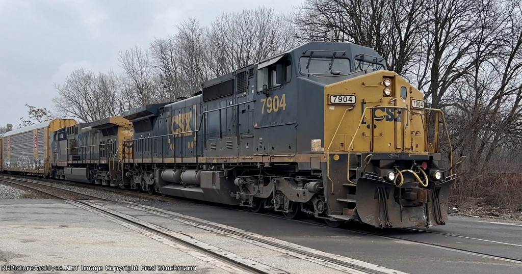 CSX 7904, it's nice to see an oldie leading.